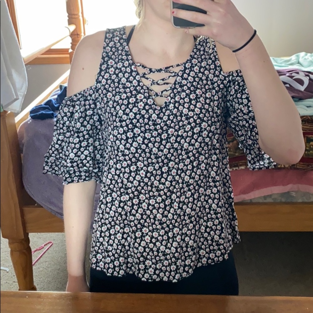 Blouse with shoulder cut outs. Floral. Size medium